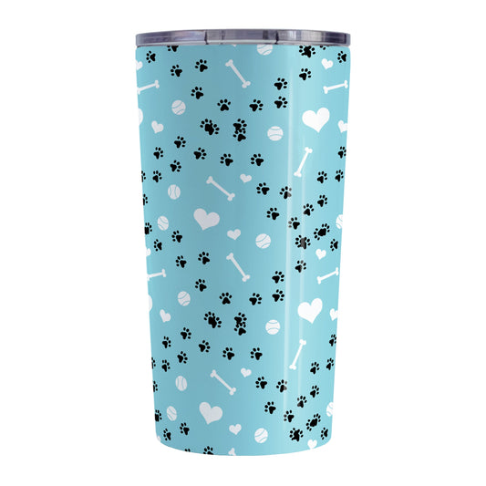 Puppy Run Blue Dog Tumbler Cup (20oz) at Amy's Coffee Mugs. A stainless steel insulated tumbler cup designed with a pattern of chaotic tracks of puppy paw prints running around the cup with white dog bones, playing balls, and hearts over a light blue background that wraps around the cup. This cup is perfect for people who love puppy dogs, cute paw print designs, and the color blue. 