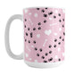 Puppy Run Pink Dog Mug (15oz) at Amy's Coffee Mugs. A ceramic coffee mug designed with a pattern of chaotic tracks of puppy paw prints running around the mug with white dog bones, balls, and hearts over a light pink background. This mug is perfect for people who love the chaotic play of puppies, love dogs, and like pink mugs. 