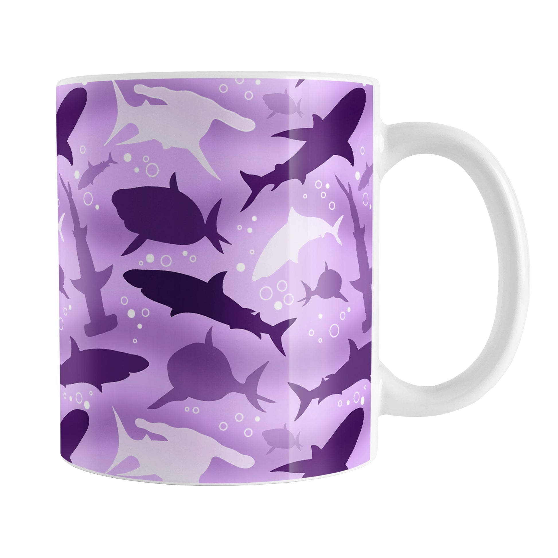 Purple Frenzy Sharks Mug (11oz) at Amy's Coffee Mugs. A ceramic coffee mug designed with a pattern of sharks in different shades of purple, in a frenzy deep beneath the purple water background, that wraps around the mug to the handle. Perfect for people who love sharks and the color purple.