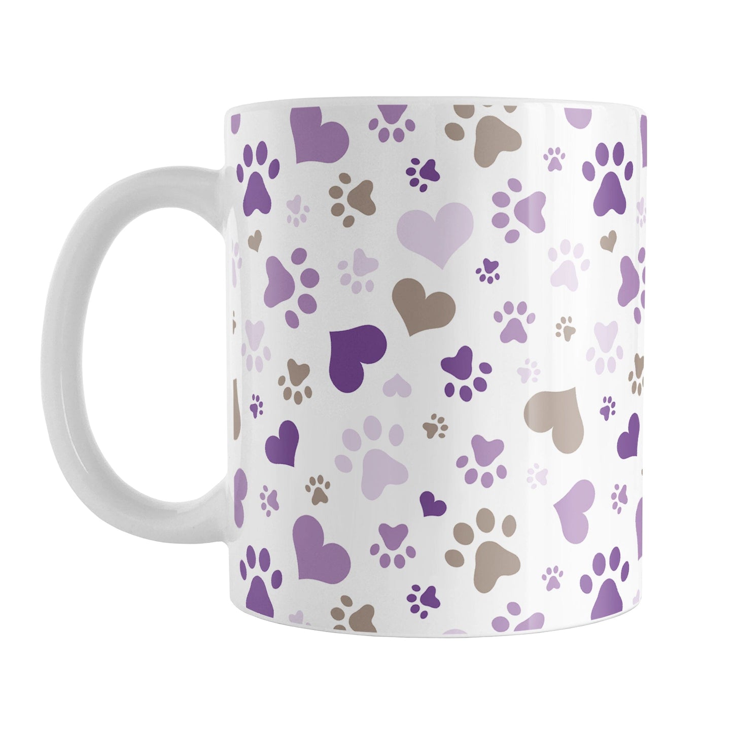 Purple Hearts and Paw Prints Mug (11oz) at Amy's Coffee Mugs. A ceramic coffee mug designed with a pattern of hearts and paw prints in brown and different shades of purple that wraps around the mug to the handle. This mug is perfect for people love dogs and cute paw print designs.