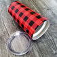 Red and Black Buffalo Plaid Tumbler Cup (20oz, on weathered wood) at Amy's Coffee Mugs. A tumbler cup designed with a red and black buffalo plaid (buffalo check) pattern that wraps around the cup. Photo shows the cup laying on its side with the lid next to it.