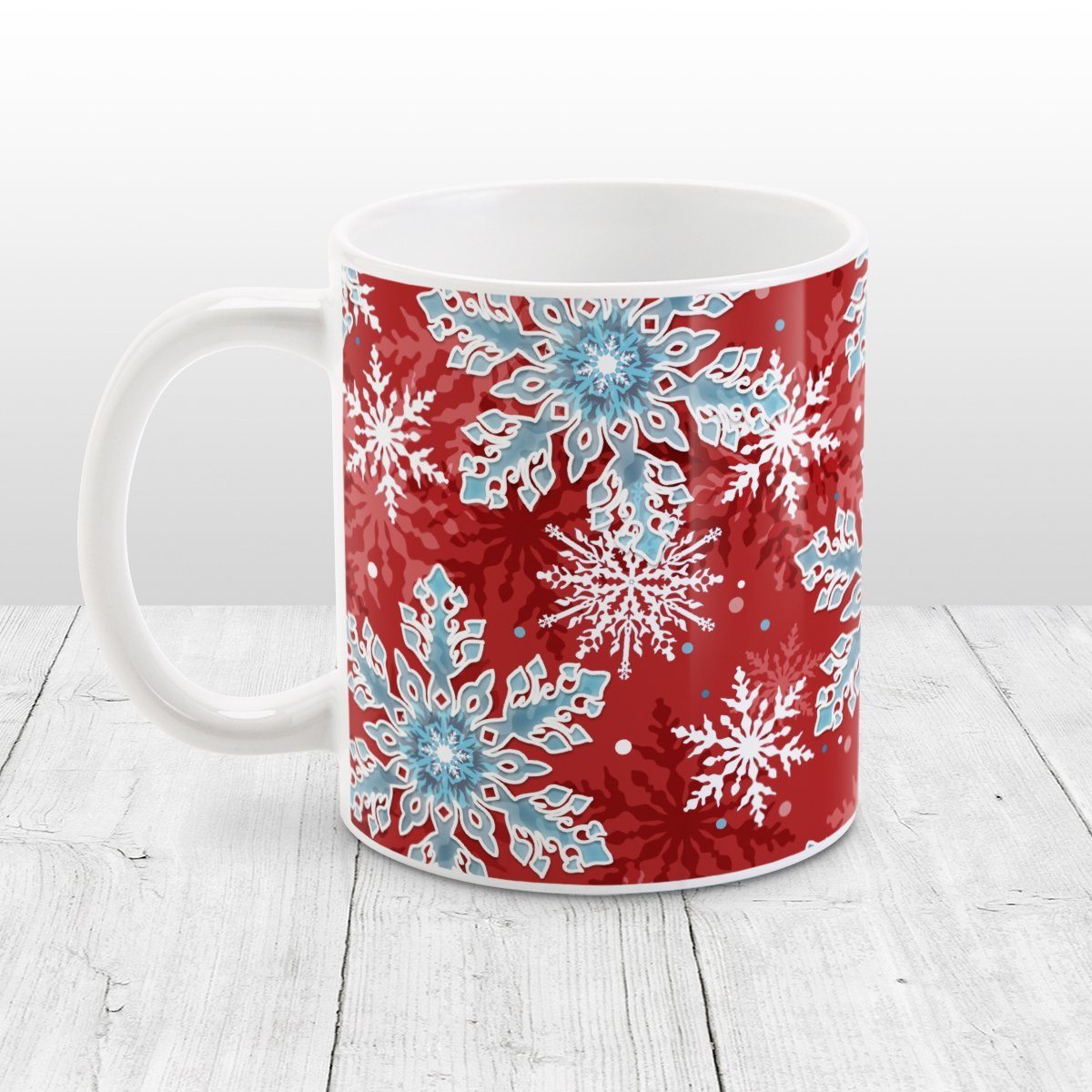 https://amyscoffeemugs.com/cdn/shop/products/red-blue-snowflake-pattern-winter-mug-at-amys-coffee-mugs-971679.jpg?v=1646495587