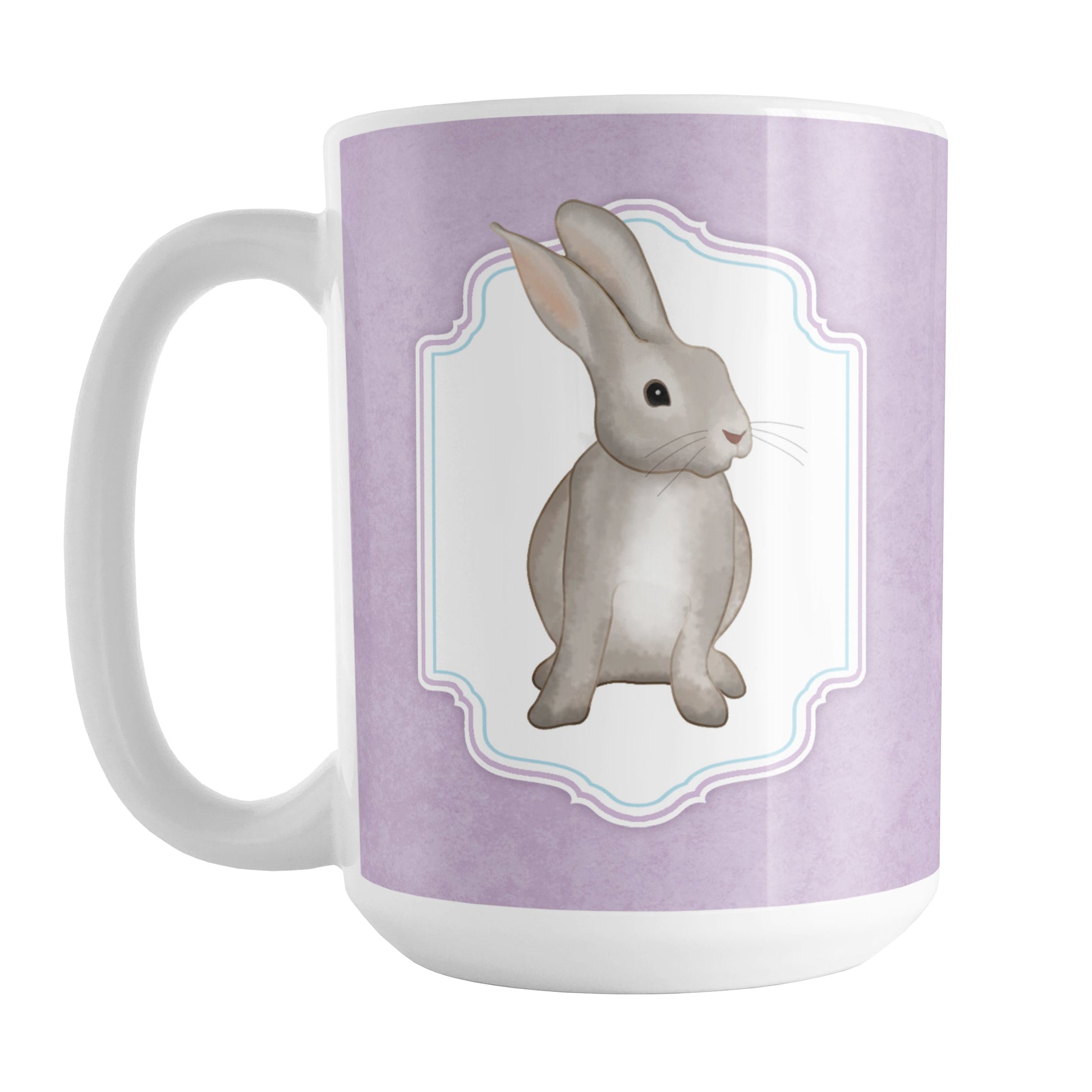 Rustic Purple Rabbit Mug (15oz) at Amy's Coffee Mugs. A ceramic coffee mug designed with a watercolor inspired illustration of a brown bunny rabbit in a white frame area outlined in purple and blue, over a rustic purple background that wraps around the mug to the handle. This bunny illustration is on both sides of this purple rabbit mug.