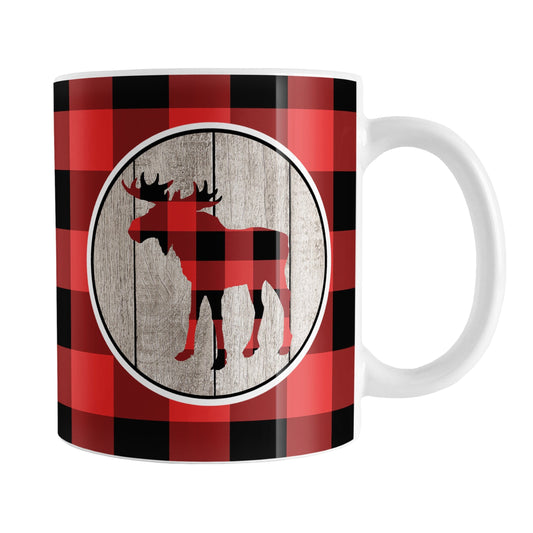Rustic Red Buffalo Plaid Moose Mug (11oz) at Amy's Coffee Mugs. A ceramic coffee mug designed with a red and black buffalo plaid pattern moose silhouette in a rustic wood circle design, on both sides of the mug over a red and black buffalo plaid pattern.