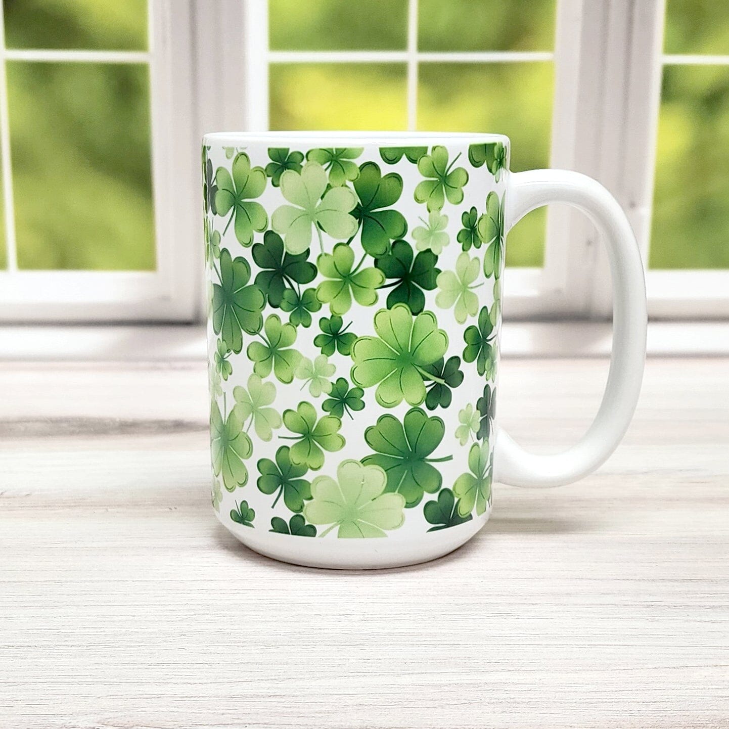 Shamrocks and 4-Leaf Clovers Mug in front of spring window view - 15oz - Amy's Coffee Mugs