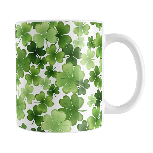 Shamrocks and 4-Leaf Clovers Mug (11oz) at Amy's Coffee Mugs. A ceramic coffee mug designed with an organic-like pattern of green shamrocks and 4-leaf clovers in different shades of green. This illustrated pattern is printed around the mug to the handle. It's perfect for anyone who loves clovers and shamrocks or wants a new mug for St. Patrick's Day.