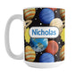 Space Planets Pattern Personalized Space Mug (15oz) at Amy's Coffee Mugs. A ceramic coffee mug designed with a space-themed pattern of planets, the sun, and stars over black that wraps around the mug up to the handle. The planets in this clustered illustration include Earth, Mars, Neptune, Jupiter, and Saturn. Your personalized name is printed in blue within a white rounded rectangular design on both sides of the mug.