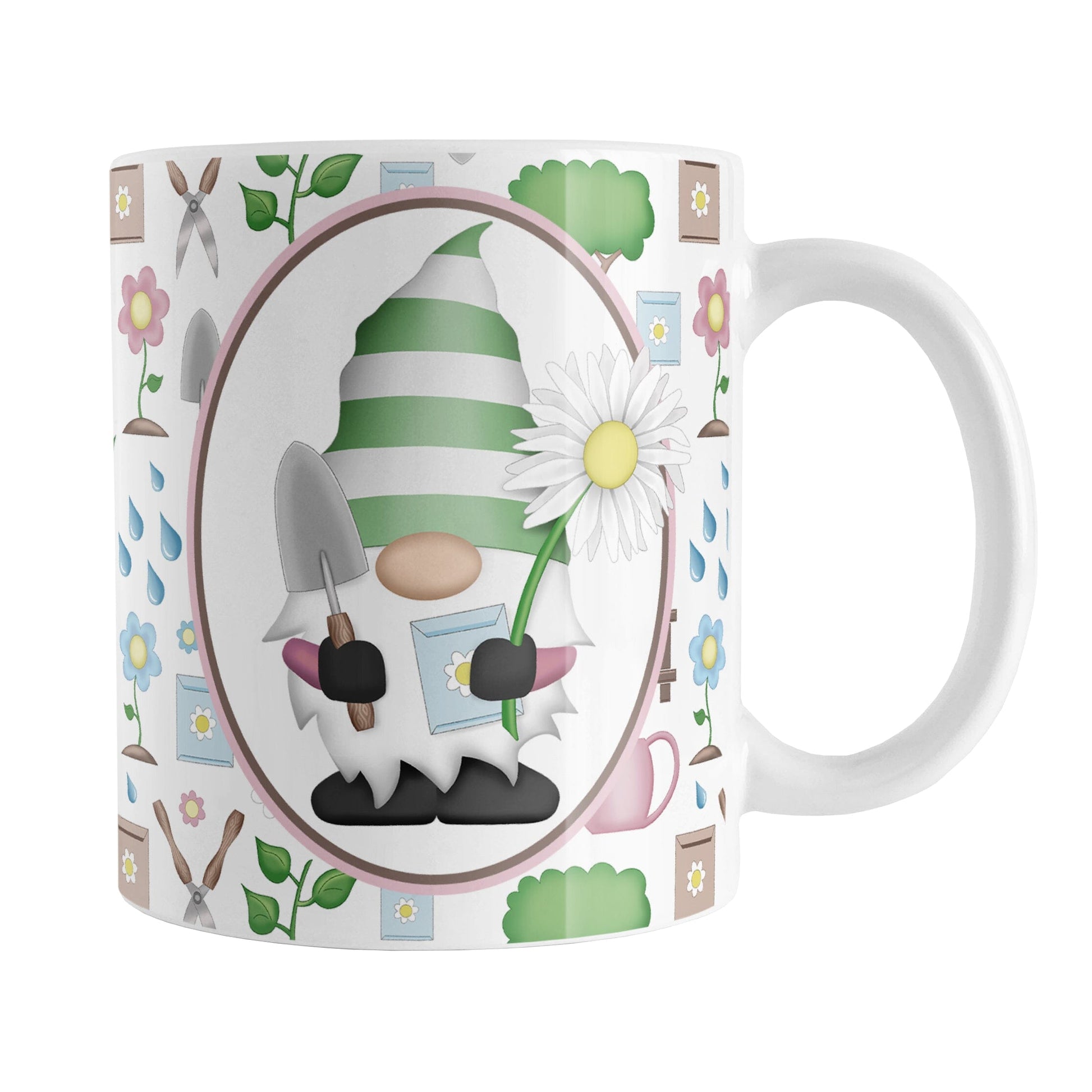 Spring Gnome Gardening Pattern Mug (11oz) at Amy's Coffee Mugs. A ceramic coffee mug designed with an adorable spring gardening gnome holding  an oversized daisy in a white oval over a springtime gardening pattern with trees, plants, flowers, seed packets, watering cans, fences, and gardening tools in spring colors such as pink, blue, green, and brown. 