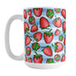 Strawberries on Blue Stripes Mug (15oz) at Amy's Coffee Mugs. A ceramic mug featuring a print of hand-drawn strawberries in red and green in an assorted pattern over a blue stripes background that wraps around the mug up to the handle.