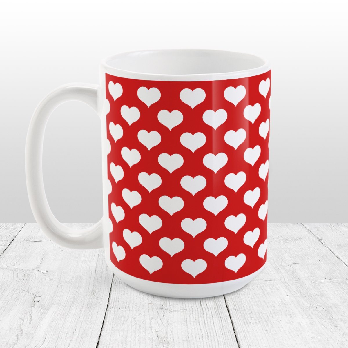 White Hearts Pattern Red Mug at Amy's Coffee Mugs. A ceramic coffee mug designed with a pattern of big white hearts over a red background color that wraps around the mug to the handle. It's the perfect mug for anyone who loves hearts and the color red.