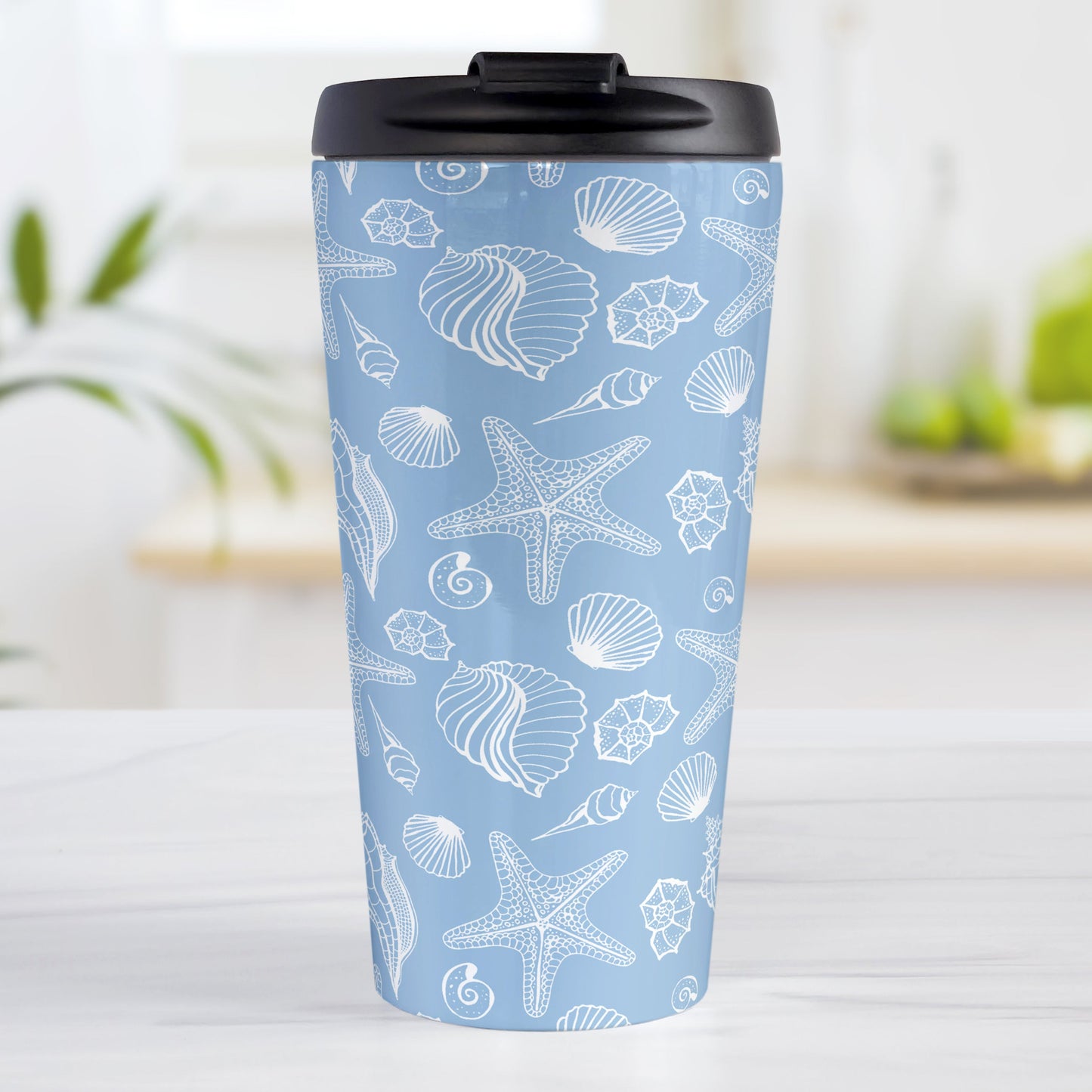White Seashell Pattern Blue Beach Travel Mug (15oz, stainless steel insulated) at Amy's Coffee Mugs. A travel mug designed with a white seashell line drawing pattern over a blue background that wraps around the travel mug.