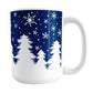 Winter Night Snow Mug (15oz) at Amy's Coffee Mugs. A ceramic coffee mug designed with an illustrated winter night snow treeline. The design features a navy blue sky is filled with white snowflakes over a row of white pine trees along the bottom.