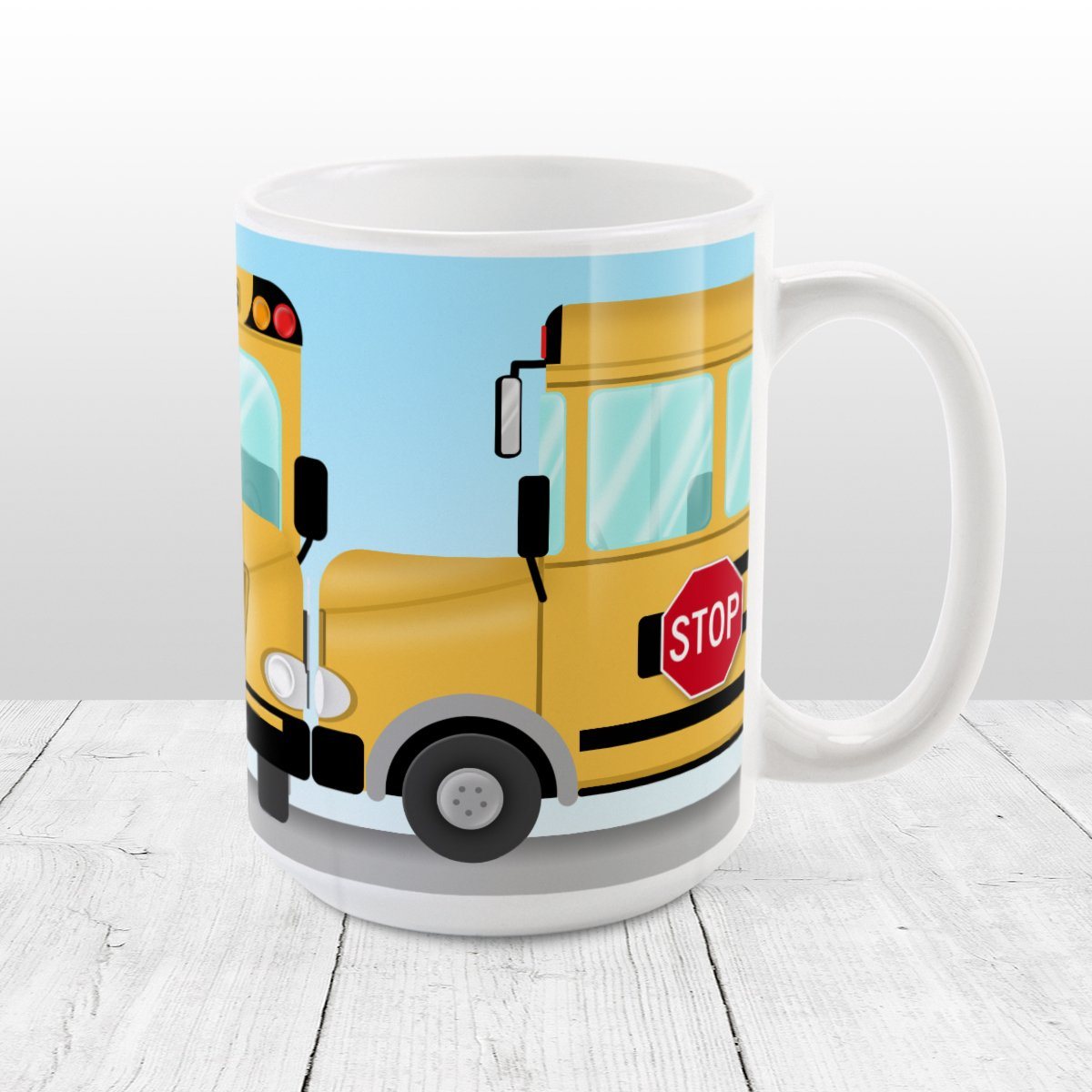Yellow School Bus Mug (15oz) at Amy's Coffee Mugs. A ceramic coffee mug designed with three views of a yellow school bus around the mug to the handle. Perfect for school bus drivers and other school professionals. 